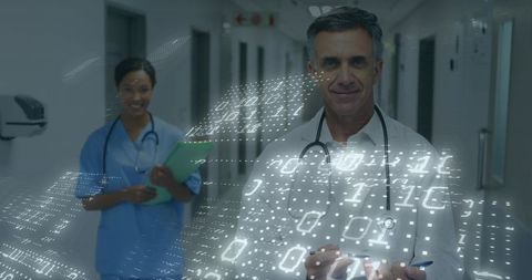 Doctor Utilizing Advanced Digital Interface in Modern Hospital Corridor