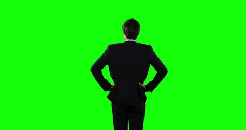 Businessman Standing with Hands on Hips on Green Screen - Download Free Stock Images Pikwizard.com