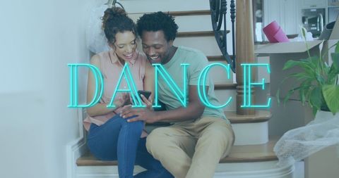 Diverse Couple on Stairs Enjoying Smartphone Together