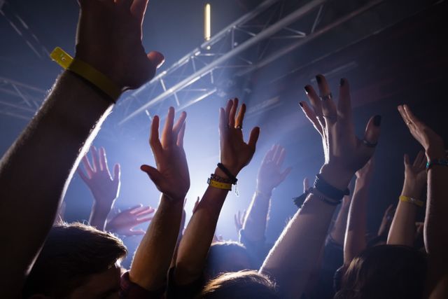 Crowd Dancing at Nightclub Concert - Download Free Stock Photos Pikwizard.com