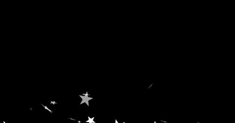 Silver Stars Falling Against Black Background