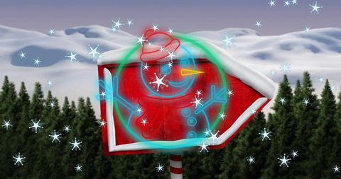 Snowman and falling snow on rustic wooden christmas sign