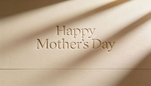 Elegant embossed happy mother's day card with sunlight casting warm diagonal shadows