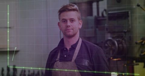 Young machinist in workshop with technology overlay design