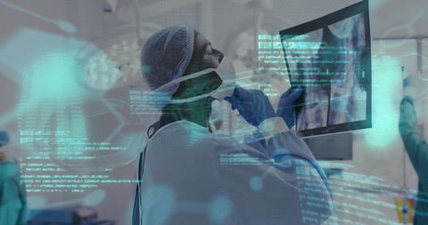Surgeon studying digital x-ray with holographic ai data overlays in operating room