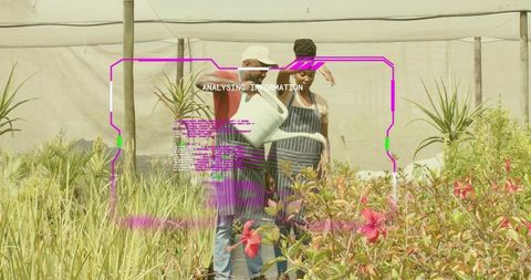 Gardeners Watering Flowers at Nursery with Futuristic Overlay