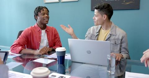 Coworkers Engaged in Productive Office Brainstorming Session