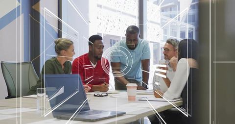 Diverse Team Discussing Project in Modern Office With Digital Interface Overlay