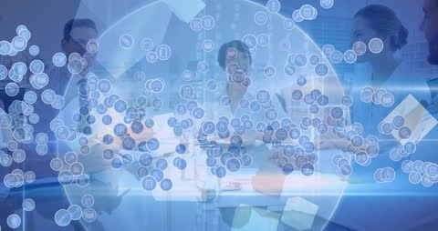 Digital Icons Overlay on Diverse Business Handshake