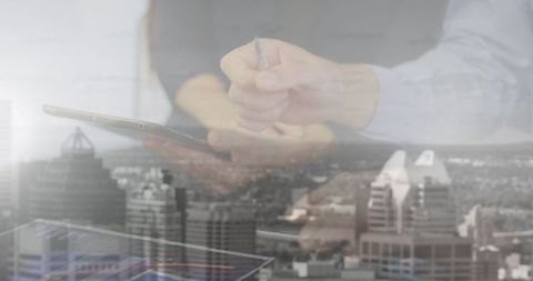 Business Collaboration and Technology Concept with Cityscape Overlay