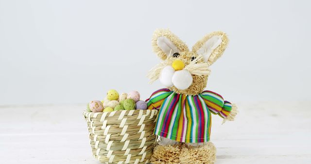 An Easter bunny and a basket of speckled eggs symbolize holiday traditions. - Download Free Stock Photos Pikwizard.com
