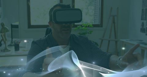 Man engaging with virtual reality digital light effects concept