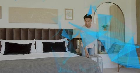 Traveler Packing Silver Suitcase in Modern Minimalist Bedroom, Unpacking Preparing Trip