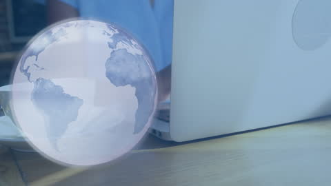 Digital Globe and Woman on Laptop Depicting Global Connections
