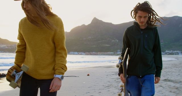 Young Friends with Longboarding on Beach at Sunset - Download Free Stock Images Pikwizard.com