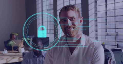 Smiling professional with holographic padlock in open-plan office, cybersecurity and teamwork