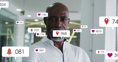 Standing executive wearing white shirt with social notification overlays in glass office