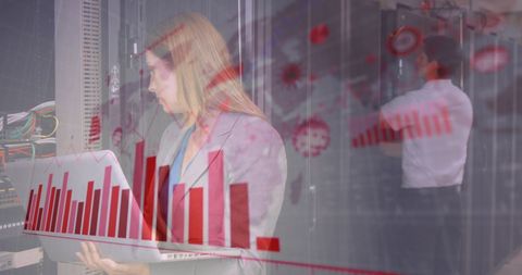 Businesswoman analyzing data in datacenter