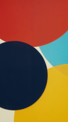 Vertical animation shifting colorful discs in abstract geometric minimalism