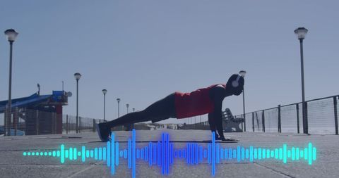 Fitness Enthusiast Exercising Outdoors with Audio Visualization