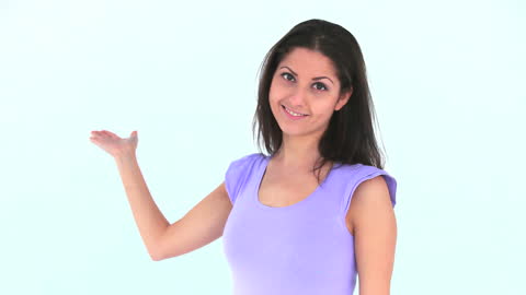 Smiling Woman Gesturing with Open Hand