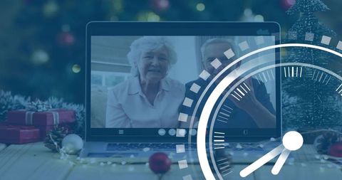 Senior Couple Video Calling Family During Cozy Holiday Celebration with Laptop Decorations