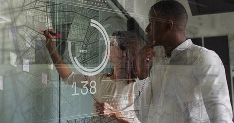 Cross-functional team planning strategy on glass wall with hud overlay and data visualization
