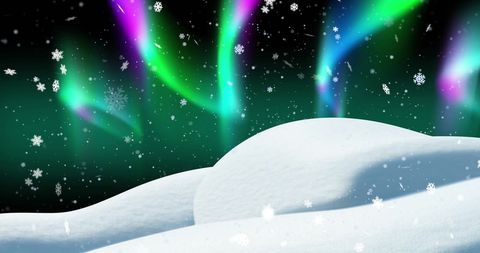 Northern Lights With Falling Snow in Winter Landscape