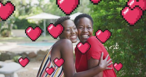 Mother and daughter hugging with animated hearts in garden
