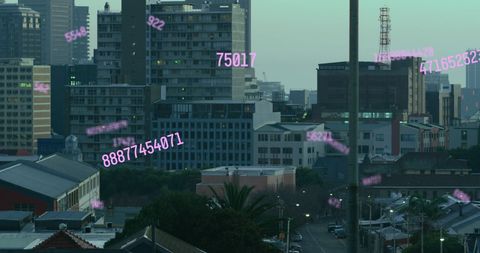 Digital numbers overlaying urban cityscape modern architecture