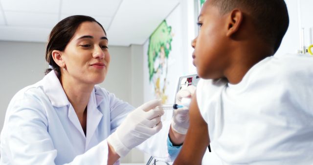 Healthcare Professional Giving Injection to Child in Clinic - Download Free Stock Images Pikwizard.com