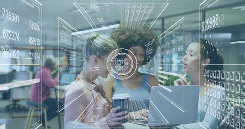 Team collaborating around laptop with augmented reality dashboards and live data visuals