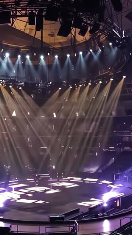 Circular Arena Stage Showcasing Dynamic Moving Head Light Show in Vertical Video