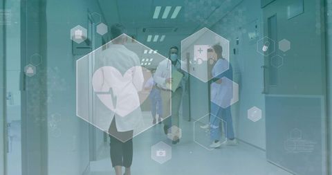 Medical staff walking hospital corridor with telehealth icons highlighting teamwork and safety