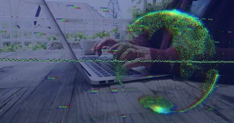 Digital globe overlay on businessman with laptop: cybersecurity and data processing