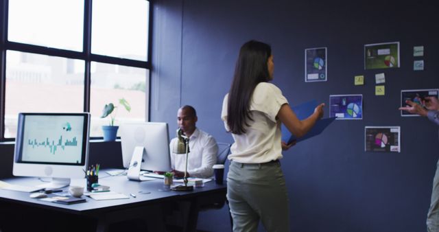 Team Brainstorming in Modern Office with Charts and Graphs - Download Free Stock Images Pikwizard.com