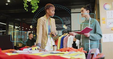 Creative Team Discussing Fashion Designs in Studio