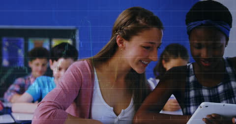 Diverse Students Engaged with Digital Technology in Classroom