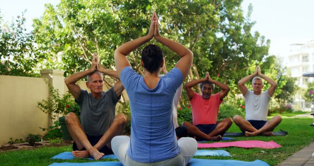 Group Yoga Class Outdoors with Instructor Leading Session - Download Free Stock Images Pikwizard.com