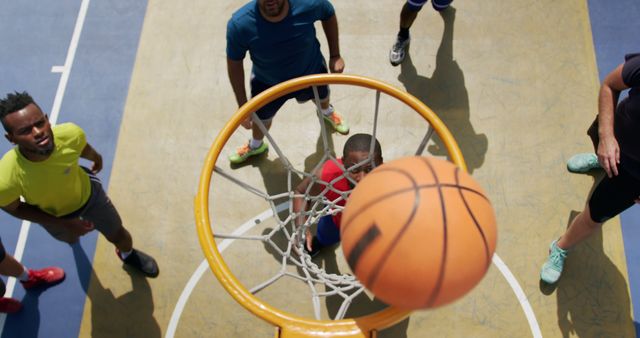 Basketball Players Watching Ball In Air Above Hoop During Game On Outdoor Court - Download Free Stock Images Pikwizard.com