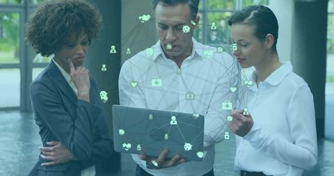 Professionals Discussing Data Visualizations in Modern Office