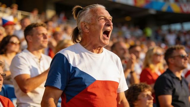Energetic senior fan cheering in stadium wearing czech flag t-shirt under golden sunlight