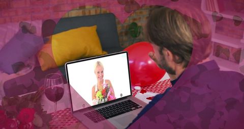 Virtual date with smiling woman on laptop screen in inspiring atmosphere