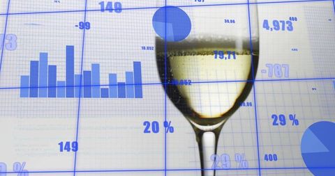 Business analytics concept featuring white wine glass overlaid with blue charts and graphs