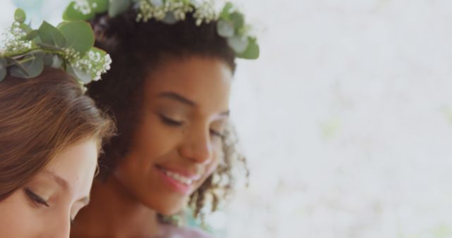 Joyful Women with Floral Headpieces at Celebration - Download Free Stock Images Pikwizard.com