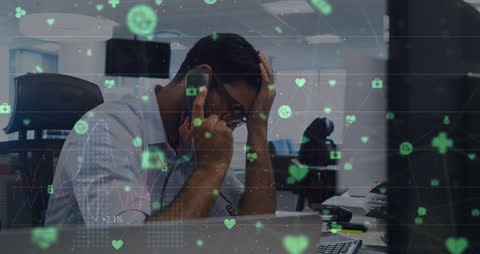 Stressed Businessman Surrounded by Digital Data and Analytics Overlay