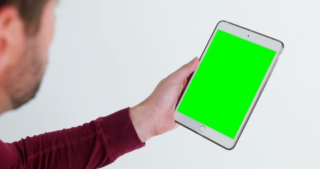 Person Holding Tablet with Green Screen Wearing Red Sweater - Download Free Stock Images Pikwizard.com