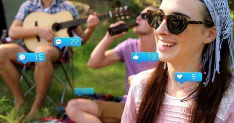 Woman relaxing outdoors with social media notifications overlaid