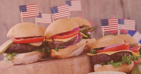 Juicy Burgers with American Flags on Wooden Board - Download Free Stock Images Pikwizard.com