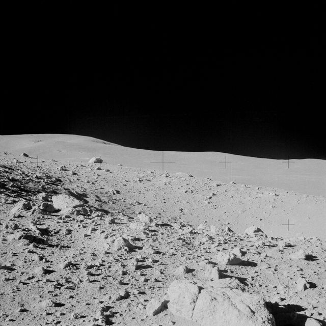 AS14-64-9118 (6 Feb. 1971) --- Astronaut Alan B. Shepard Jr., commander, photographed this overall view of a field of boulders on the flank of Cone Crater, during the second extravehicular activity (EVA), on Feb. 6, 1971. The view is looking south across the lunar valley through which the Apollo 14 moon-explorers flew their Lunar Module (LM) during the final approach to the landing. Astronaut Edgar D. Mitchell, lunar module pilot, joined Shepard in exploring the moon, while astronaut Stuart A. Roosa, command module pilot, remained with the Command and Service Modules (CSM) in lunar orbit.